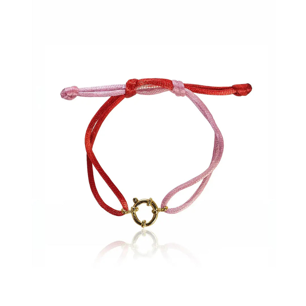 bracciale in filo satinato colore rosa e rosso con ciondolo fermaglio marinaio in acciaio inox colore oro. Regalo per donna  e uomo per ogni occasione.